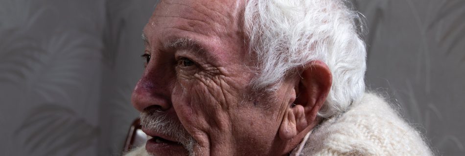 Older man in discussion